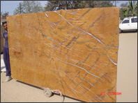 rainforest gold marble slabs